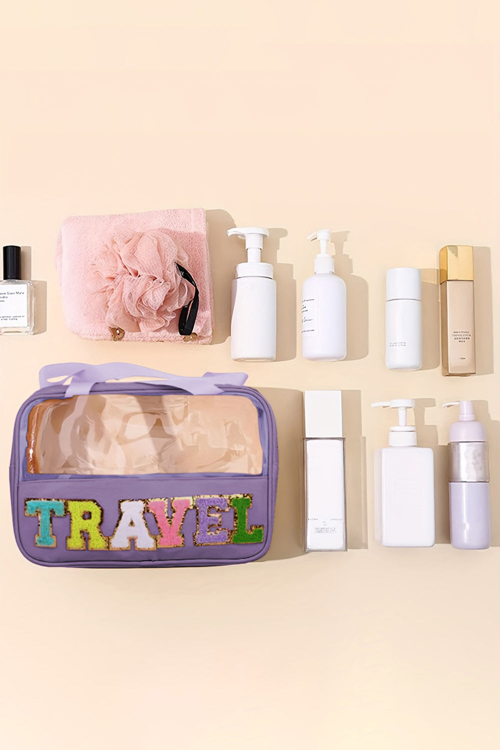 Makeup-taske gennemsigtig PVC med plysdetaljer